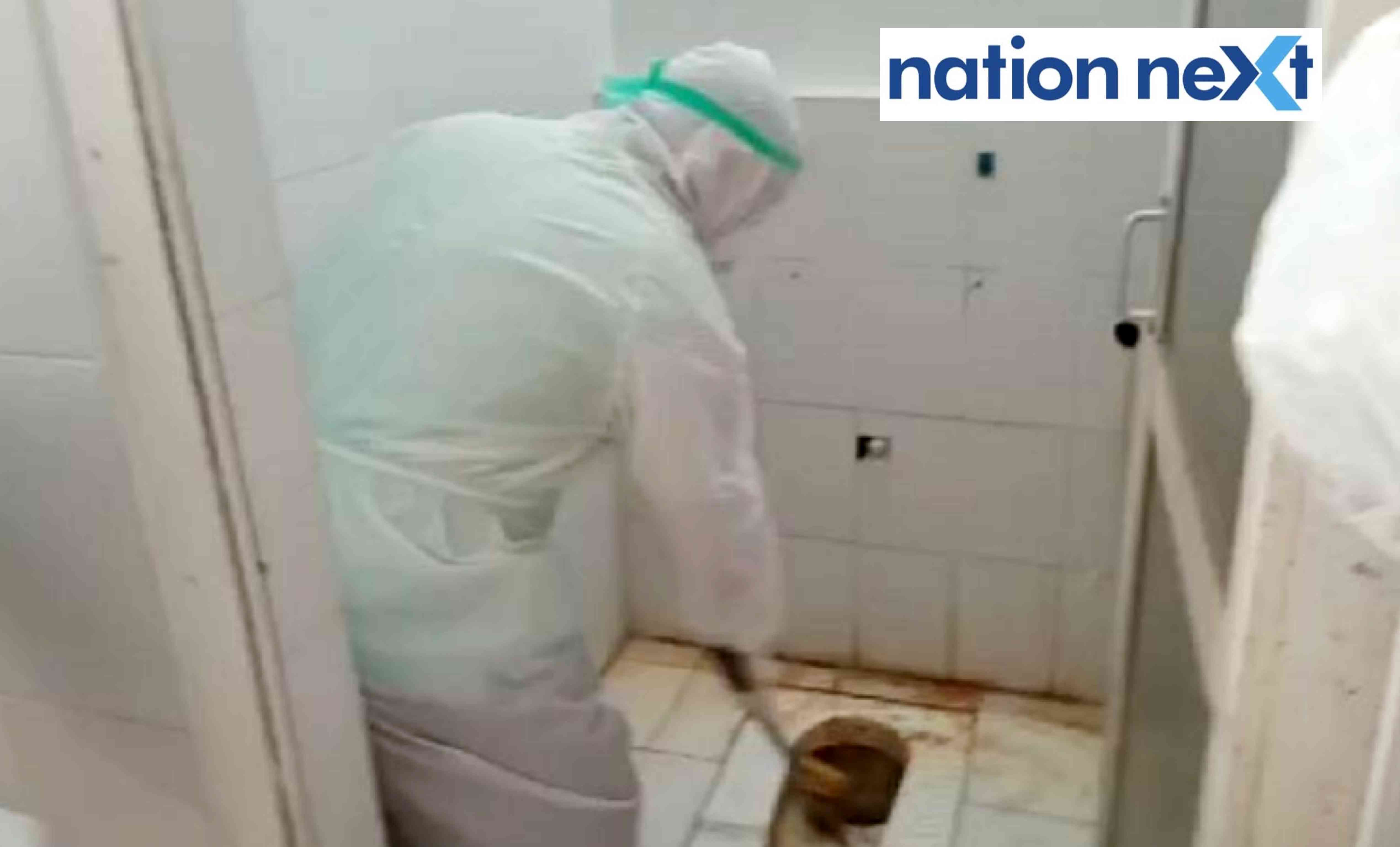 Malladi Krishna Rao cleaning the toilet